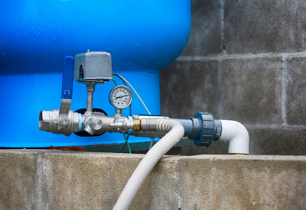 Pressure switch, pressure gauge and shutoff valve on the inlet of a blue well pressure tank